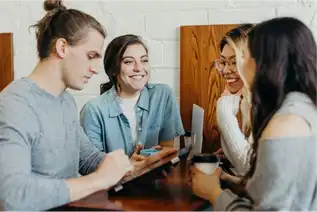 Happy group of friends after IFC group therapy session